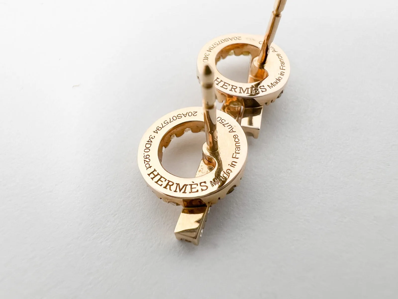 Elevate your e-commerce product title by incorporating enticing modifiers. Heres a suggestion:

Luxury Hermes Finesse Earrings - Exquisite Designer Jewelry with Elegant Detailing