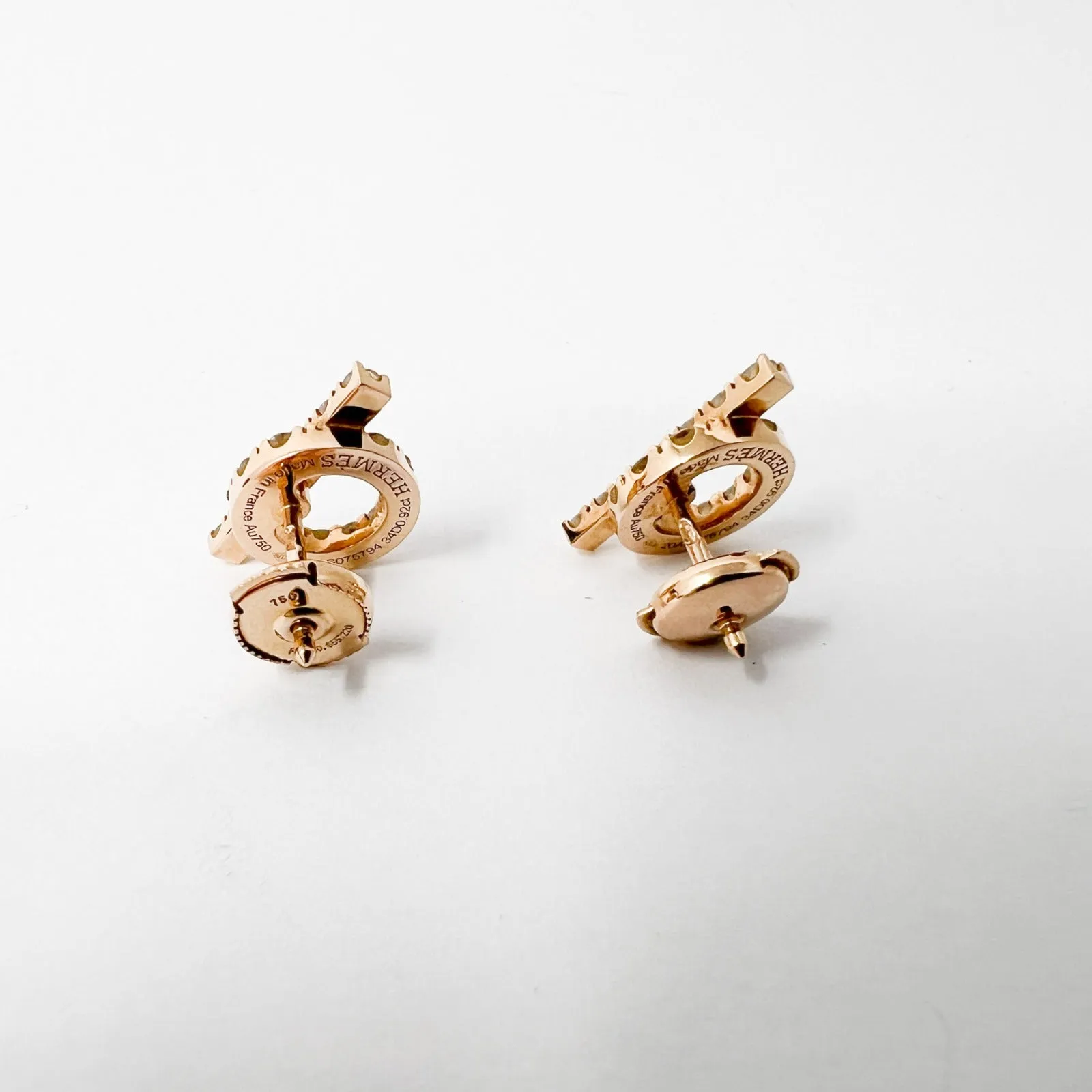 Elevate your e-commerce product title by incorporating enticing modifiers. Heres a suggestion:

Luxury Hermes Finesse Earrings - Exquisite Designer Jewelry with Elegant Detailing