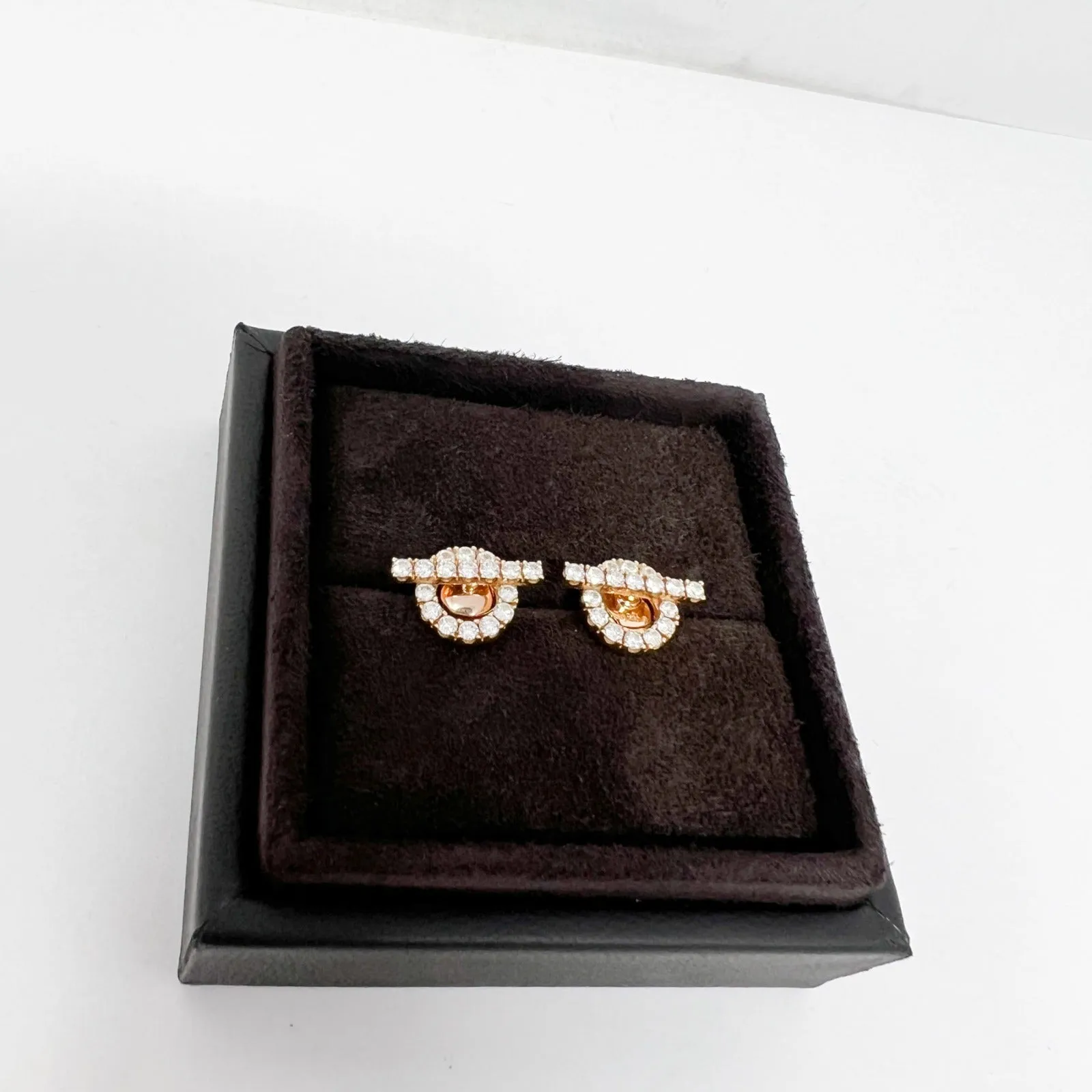 Elevate your e-commerce product title by incorporating enticing modifiers. Heres a suggestion:

Luxury Hermes Finesse Earrings - Exquisite Designer Jewelry with Elegant Detailing