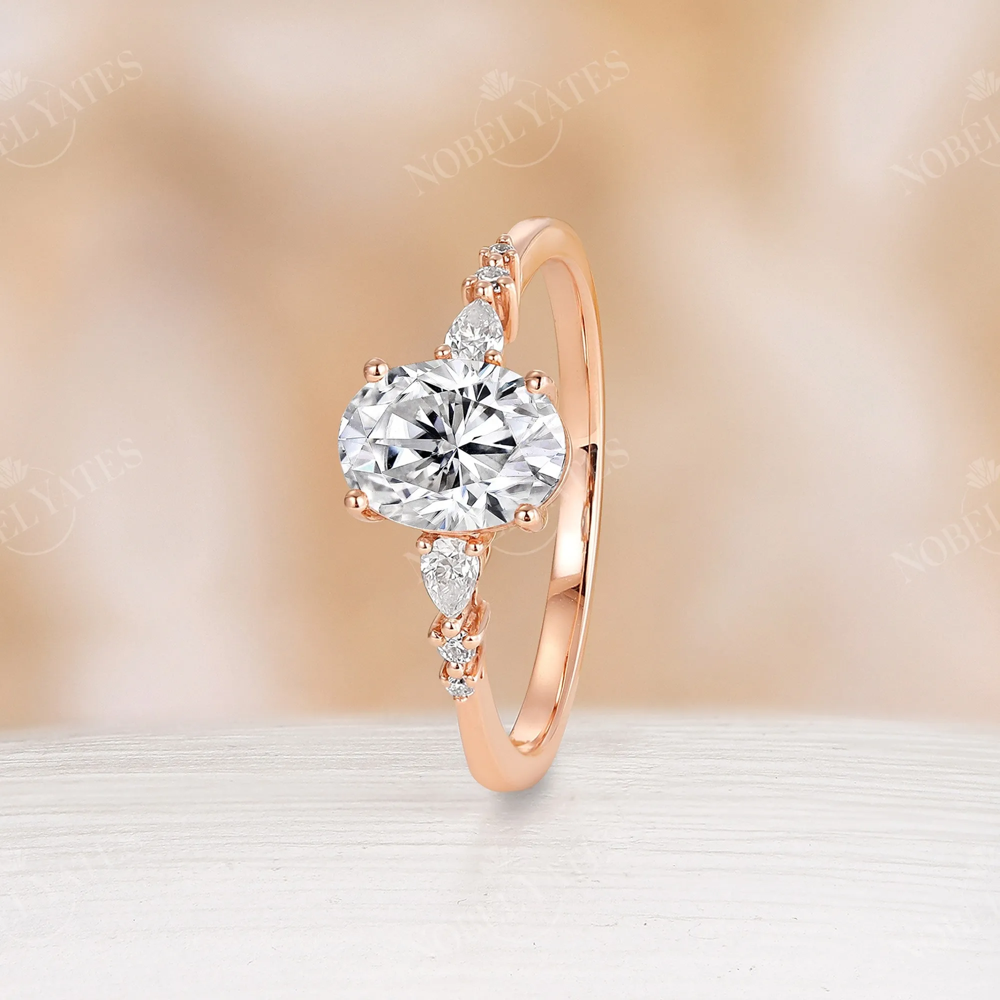 Moissanite Prong Set Engagement Ring Side Stone Rose Gold