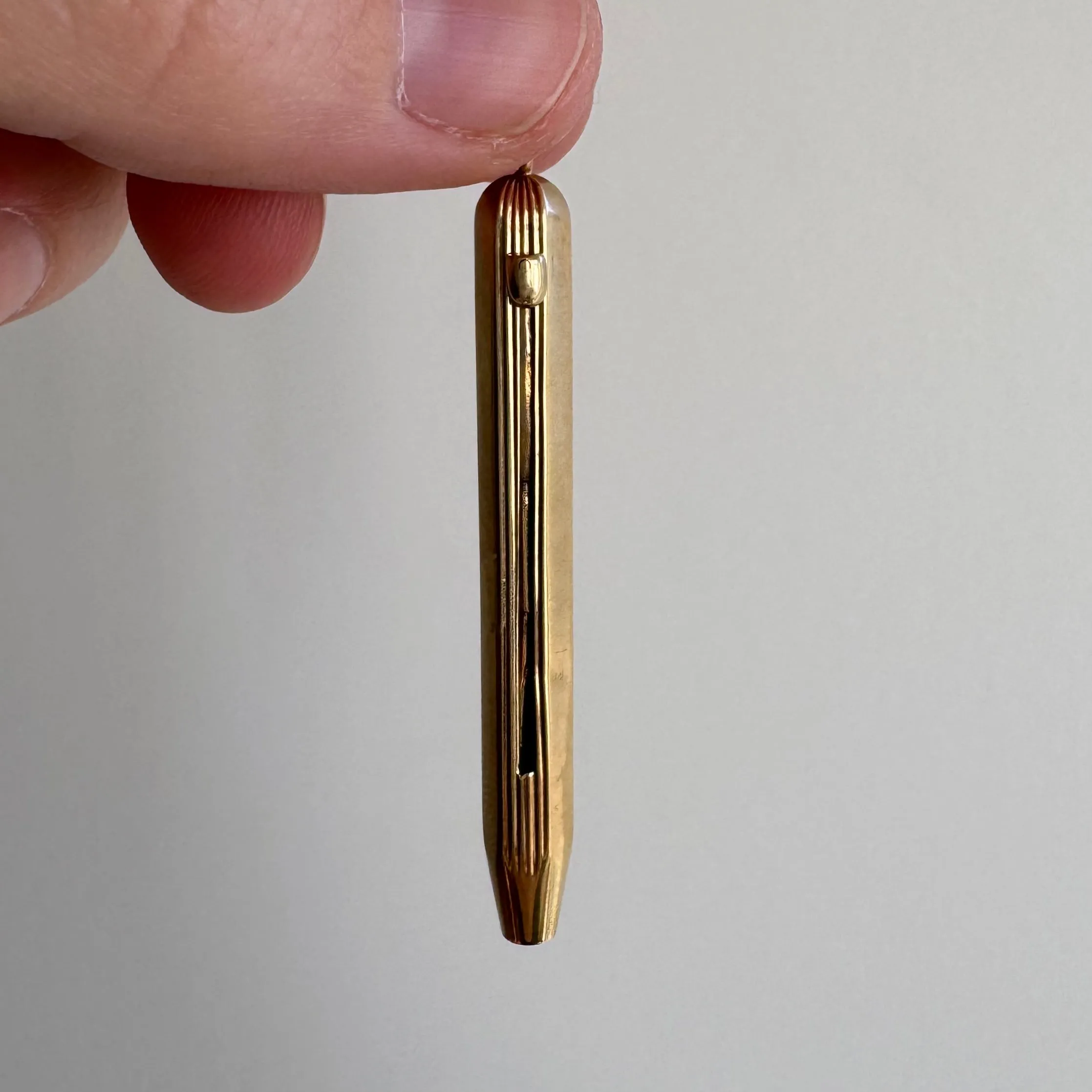 V I N T A G E // retractable toothpick / 14k yellow gold / a statement pendant